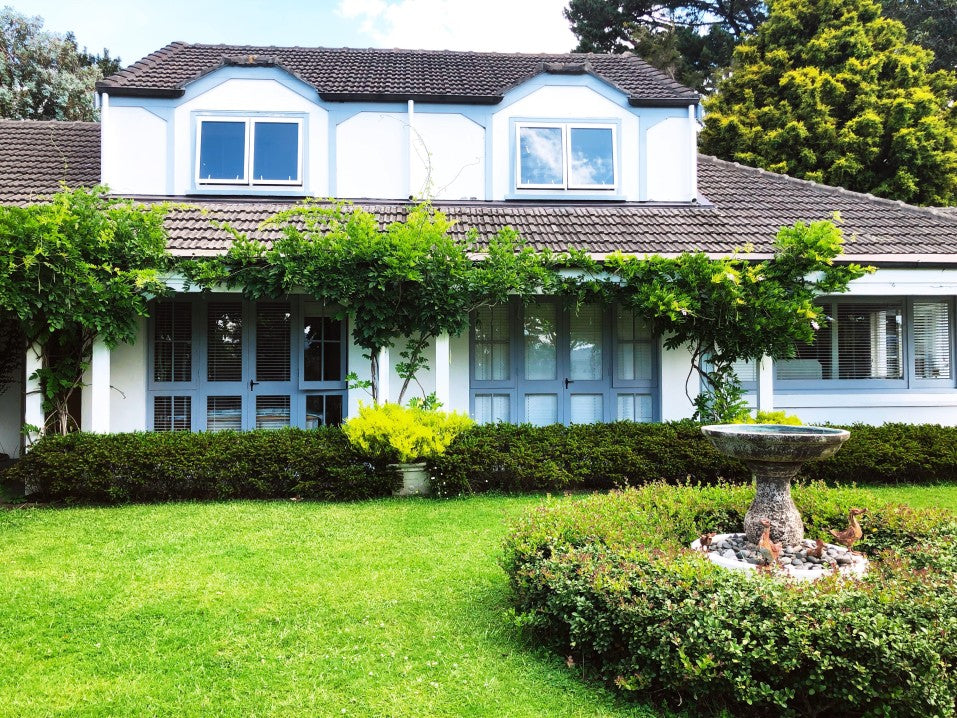 house with healthy lawn