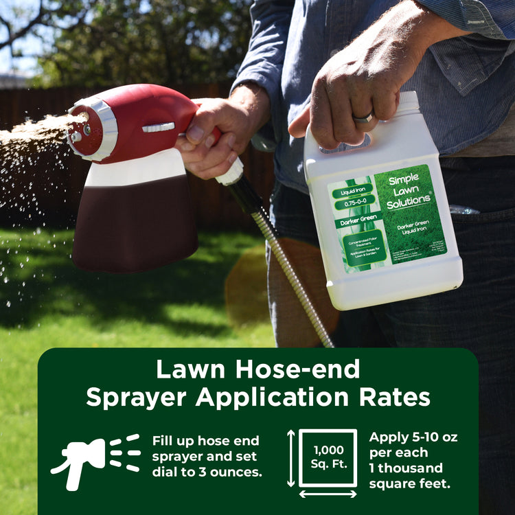 Lawn hose-end sprayer applying a liquid iron fertilizer.