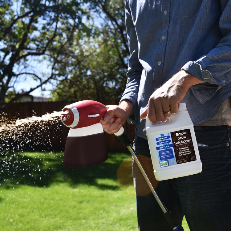 Seaweed Soil Hume applied with ortho sprayer to lawn