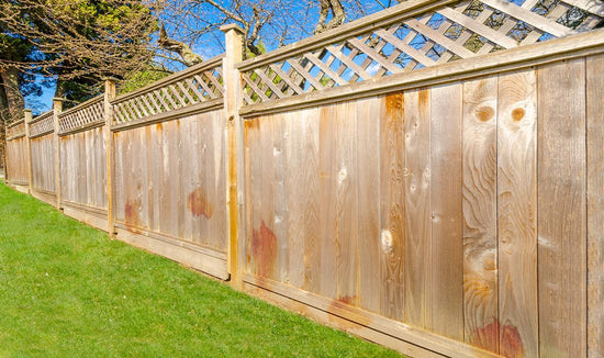 how to remove fertilizer iron stains from fence