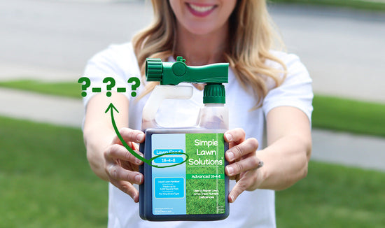 Woman holding Simple Lawn Solutions ready-to-use hose-end fertilizer