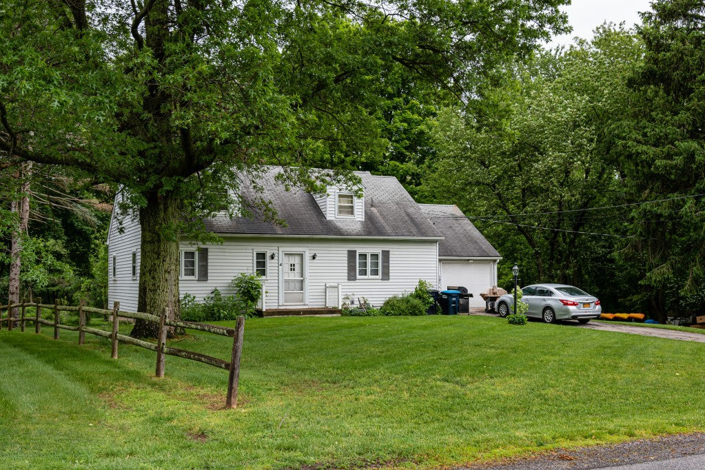 House with green grass.