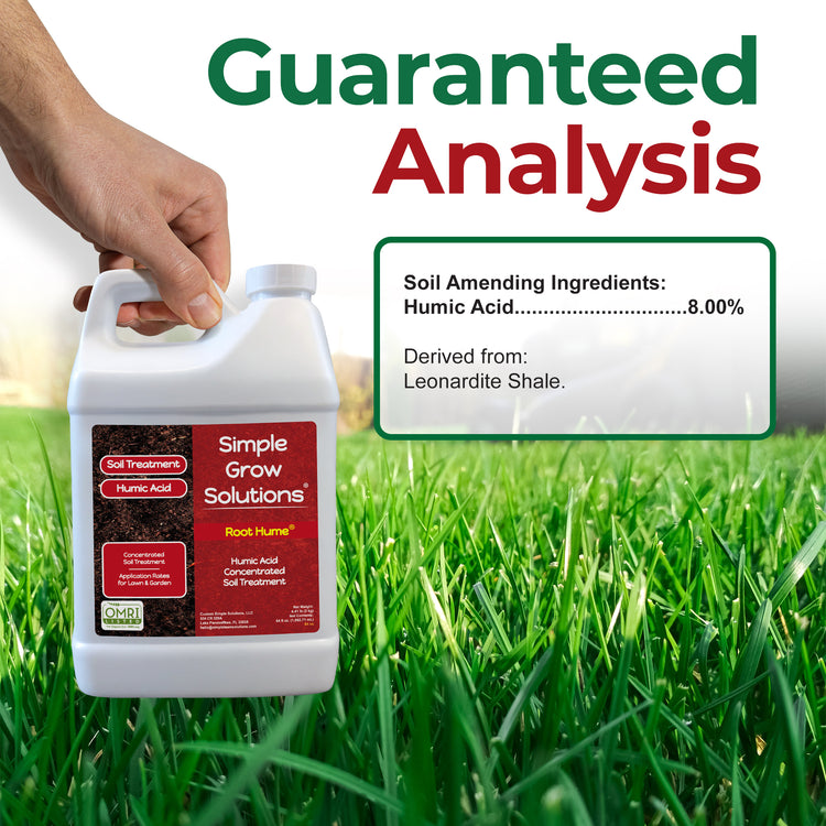 A hand holds a white plastic jug of Simple Grow Solutions Root Hume Root Zone Acid Treatment, set against a vibrant green grass background. The image features promotional text overlays reading &