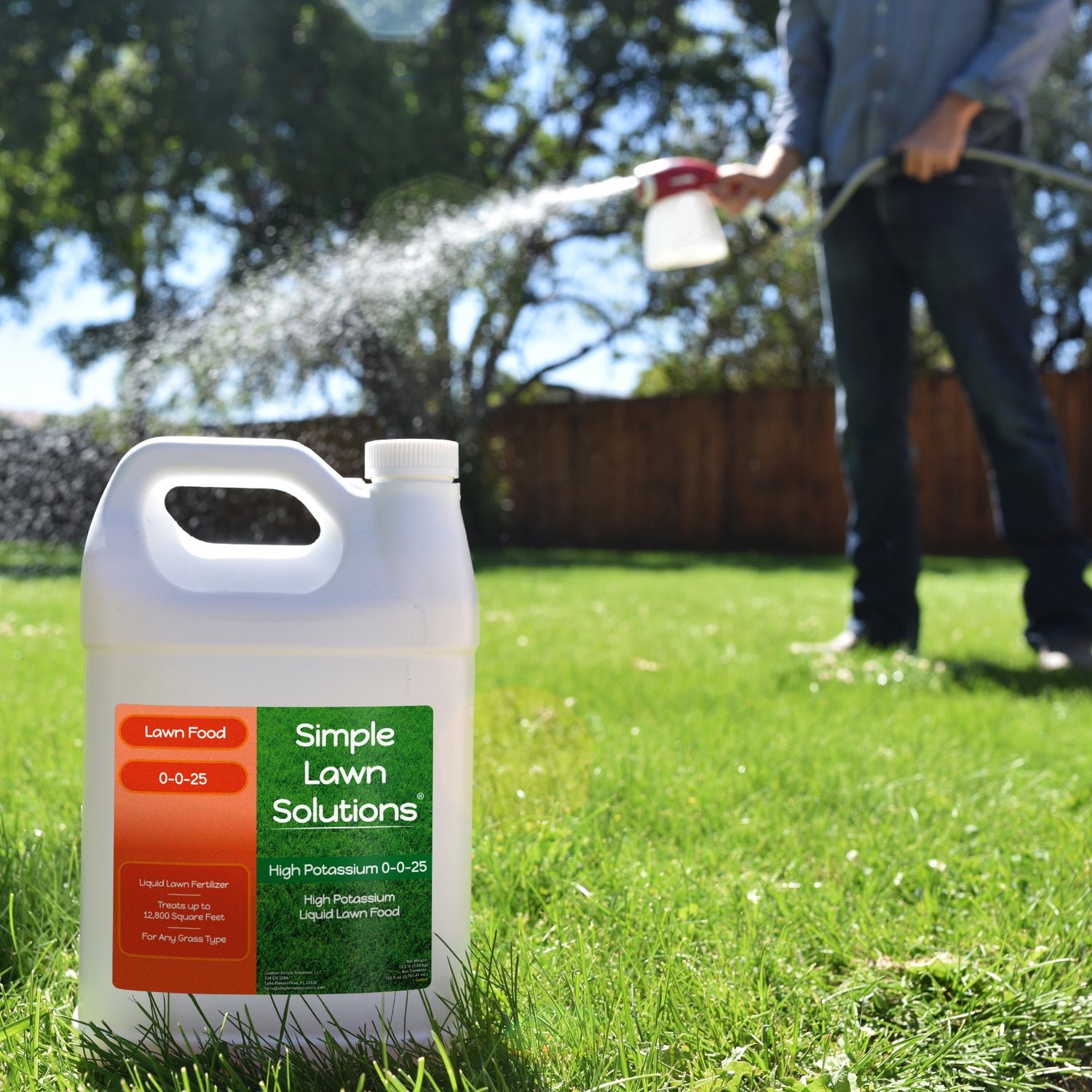 High Potassium Lawn Fertilizer applied to lawn using hose-end sprayer