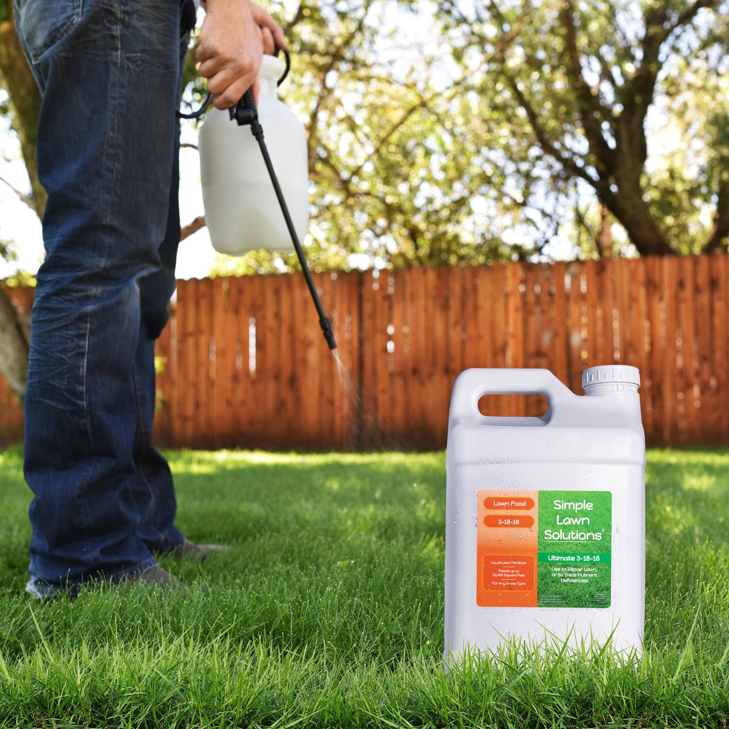 simple lawn solutions fertilizer applied to lawn with pump-sprayer