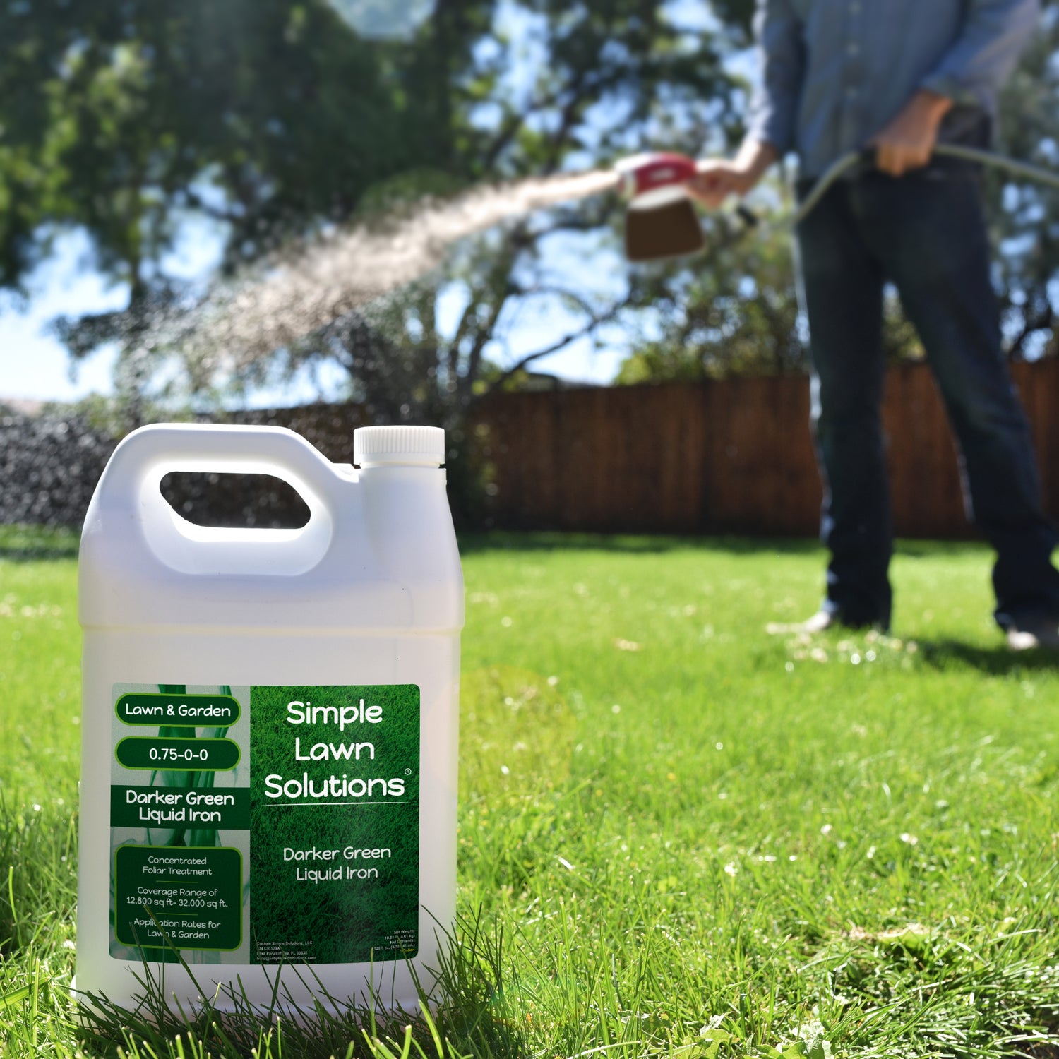 Darker Green Liquid Iron (1 Gallon) by Simple Lawn Solutions on a lawn