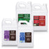 A set of four 1 gallon white plastic jugs with labels,  the Simple Grow Solutions OMRI Bundle with Soil Hume, Root Hume, Sea Hume and Micro Booster on a white background